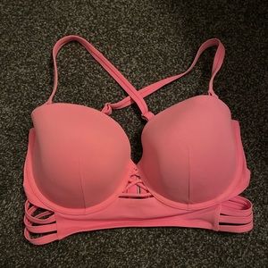36DD Victoria’s Secret coral pink swimsuit. Very supportive!